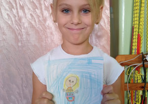 Dziecko prezentuje swój portret